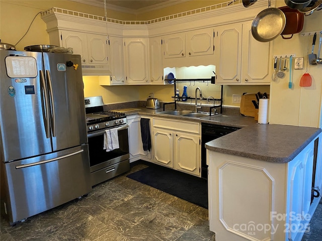 kitchen with stainless steel appliances, a peninsula, white cabinets, and dark countertops