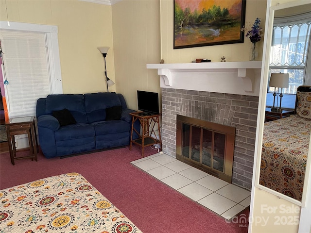 living area with a fireplace and carpet floors