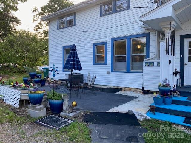 back of property with a patio area