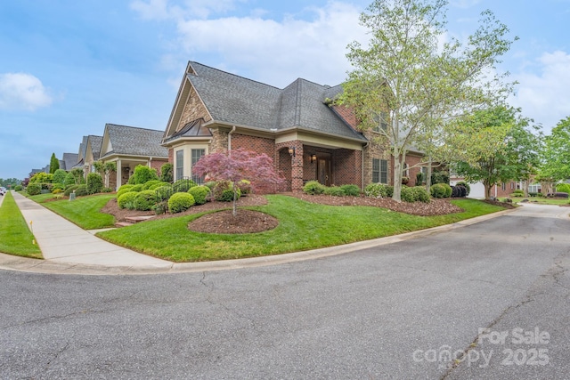 104 Hallmark Xing, Rock Hill, SC 29732 - view of front of property featuring brick siding, a front lawn, and roof with shingles