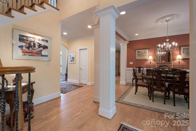 104 Hallmark Xing, Rock Hill, SC 29732 - dining space featuring ornate columns, ornamental molding, light wood finished floors, and recessed lighting