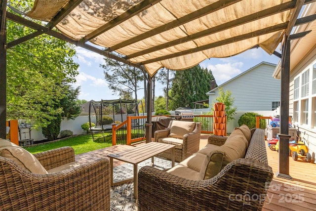 view of patio / terrace featuring outdoor lounge area, a pergola, a fenced backyard, a trampoline, and a deck