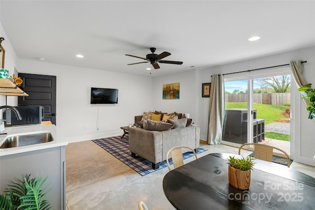 110 Hayden Way, Asheville, NC 28803 - living area with concrete flooring, baseboards, a ceiling fan, and recessed lighting