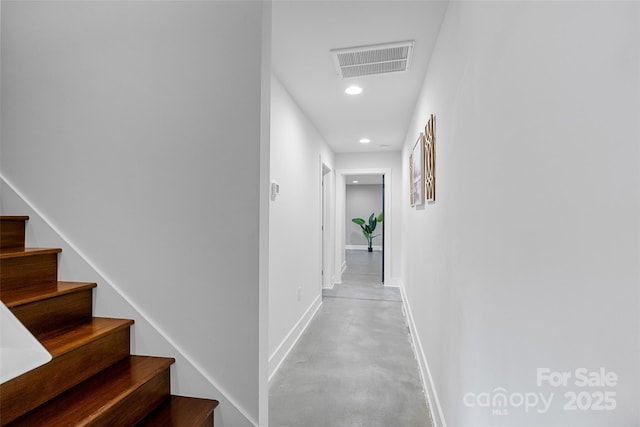 110 Hayden Way, Asheville, NC 28803 - hallway with baseboards, recessed lighting, stairway, finished concrete flooring, and visible vents