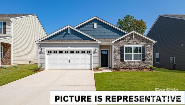 craftsman-style house with an attached garage, a front lawn, driveway, and stone siding