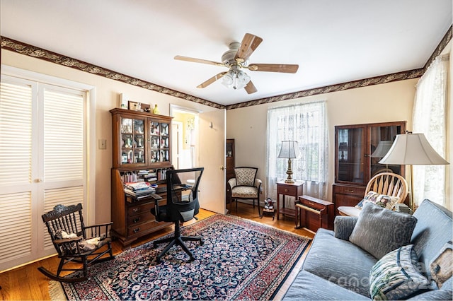 office with ceiling fan and wood finished floors