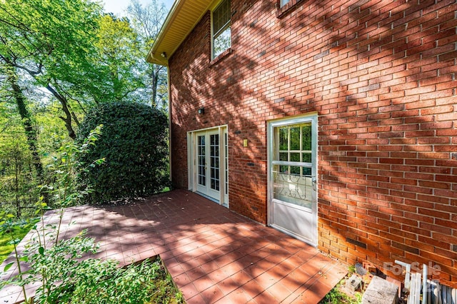 wooden terrace featuring french doors