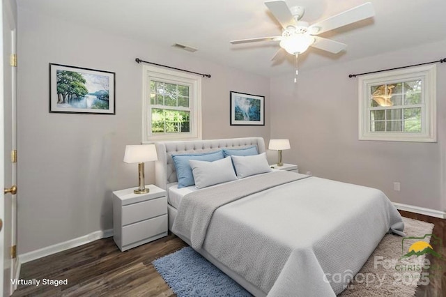 22025 Torrence Chapel Rd, Cornelius, NC 28031 - bedroom with baseboards, dark wood-style flooring, and ceiling fan