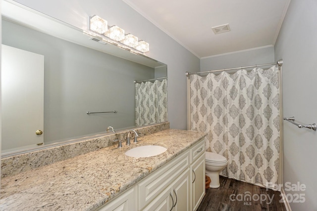 22025 Torrence Chapel Rd, Cornelius, NC 28031 - full bathroom with toilet, ornamental molding, wood finished floors, vanity, and curtained shower