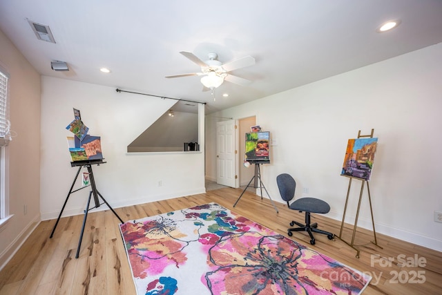rec room with wood finished floors, recessed lighting, and a ceiling fan