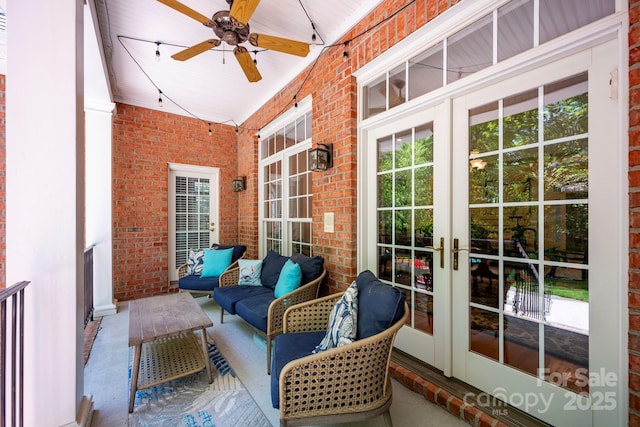 exterior space featuring ceiling fan and french doors