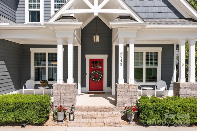 entrance to property with a porch