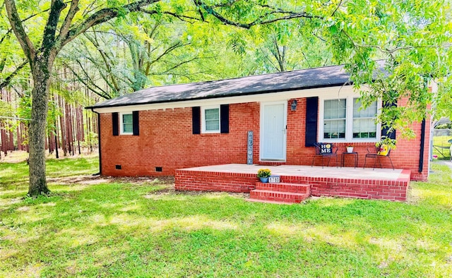 1780 Short St, Mount Pleasant, NC 28124 - view of front of property featuring crawl space, a front lawn, brick siding, and roof with shingles