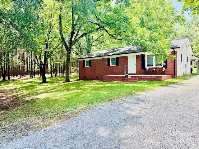 1780 Short St, Mount Pleasant, NC 28124 - single story home featuring crawl space, brick siding, a front yard, and driveway