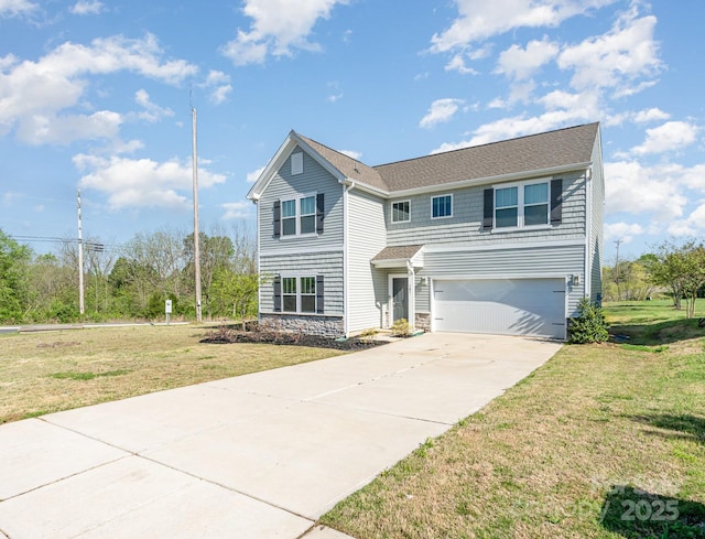traditional-style home with a garage, a front yard, driveway, and stone siding