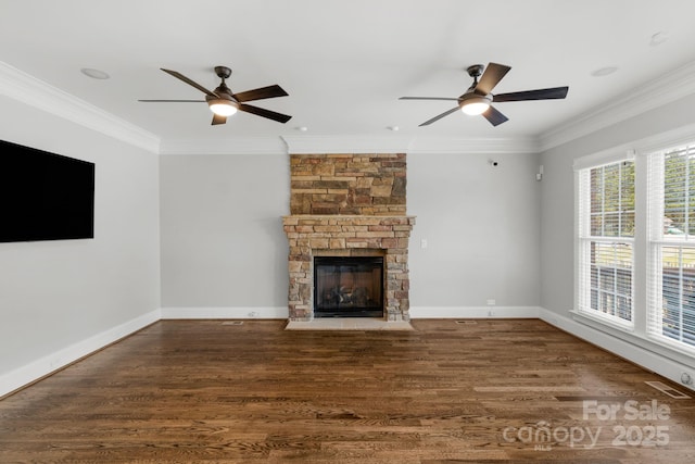 9008 Skipaway Dr, Waxhaw, NC 28173 - unfurnished living room with a ceiling fan, ornamental molding, wood finished floors, a fireplace, and baseboards