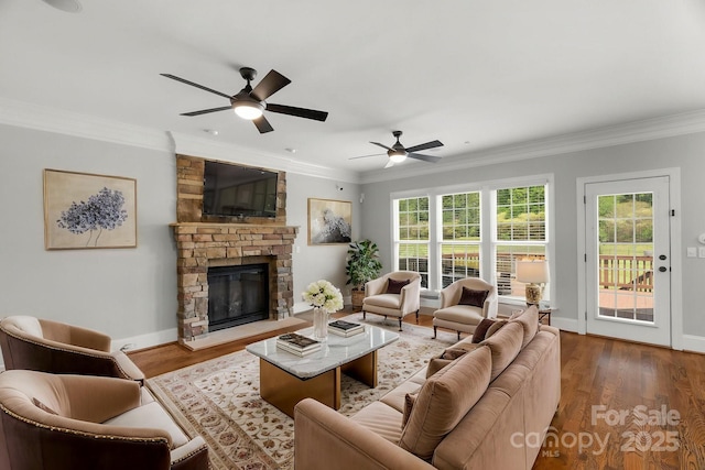 9008 Skipaway Dr, Waxhaw, NC 28173 - living area featuring ceiling fan, ornamental molding, wood finished floors, and healthy amount of natural light