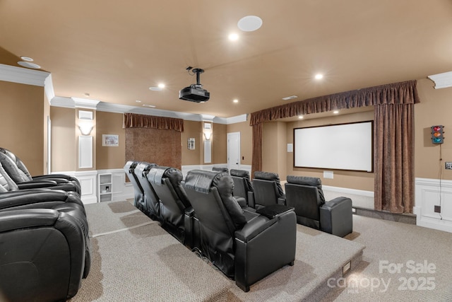 9008 Skipaway Dr, Waxhaw, NC 28173 - carpeted home theater room featuring ornamental molding, a decorative wall, a wainscoted wall, and ornate columns