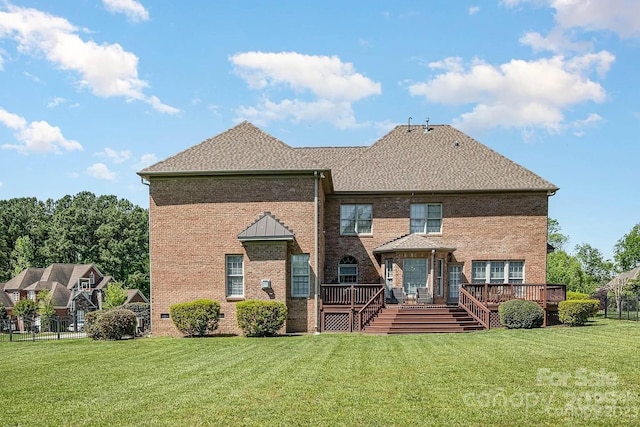 9008 Skipaway Dr, Waxhaw, NC 28173 - back of house with a wooden deck and brick siding