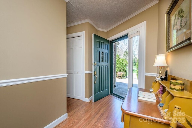 102 Glenbrook Dr, Hendersonville, NC 28739 - interior space with baseboards, light wood-style floors, a textured ceiling, and ornamental molding