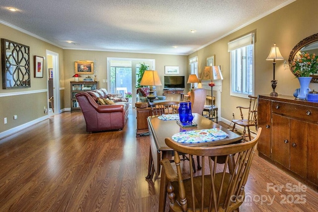 102 Glenbrook Dr, Hendersonville, NC 28739 - dining space featuring baseboards, a textured ceiling, ornamental molding, and wood finished floors