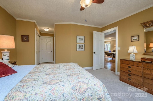 102 Glenbrook Dr, Hendersonville, NC 28739 - bedroom with baseboards, a textured ceiling, crown molding, a ceiling fan, and light colored carpet
