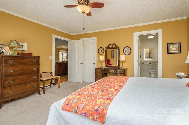 102 Glenbrook Dr, Hendersonville, NC 28739 - bedroom featuring ornamental molding, ensuite bath, a textured ceiling, a ceiling fan, and light colored carpet