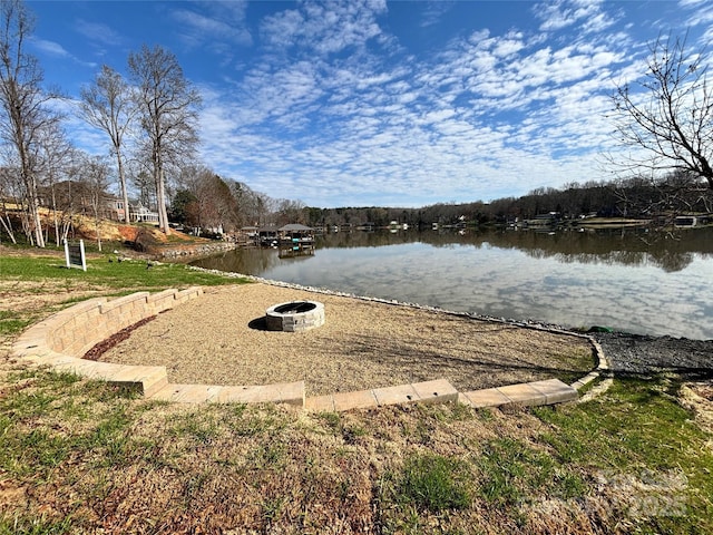 water view with a fire pit