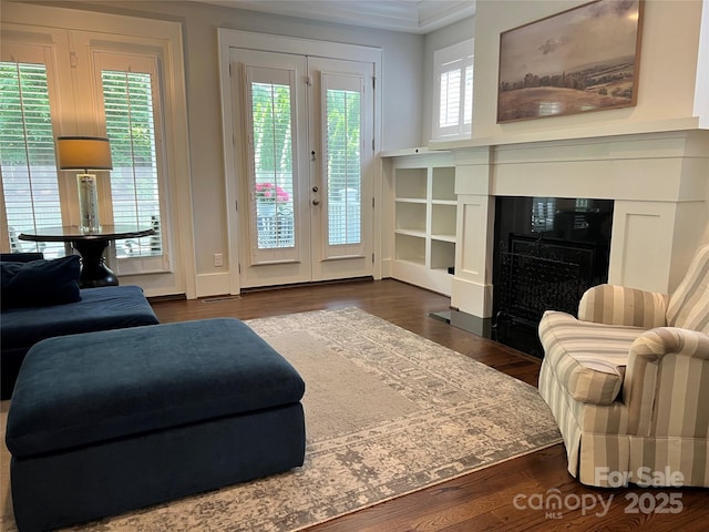 1550 Matthew Mcclure Cir, Davidson, NC 28036 - living area with dark wood-style floors and crown molding