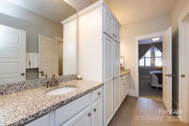 1550 Matthew Mcclure Cir, Davidson, NC 28036 - ensuite bathroom with vanity and tile patterned floors