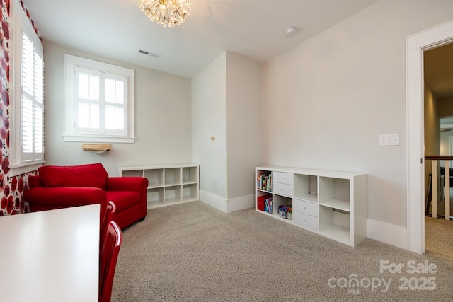 1550 Matthew Mcclure Cir, Davidson, NC 28036 - living area featuring carpet and a chandelier