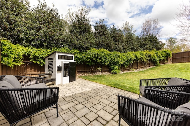1550 Matthew Mcclure Cir, Davidson, NC 28036 - fenced backyard with a patio area, outdoor lounge area, and a shed