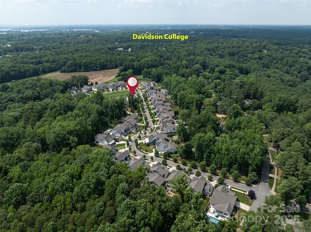 1550 Matthew Mcclure Cir, Davidson, NC 28036 - aerial overview of property's location with a forest and nearby suburban area