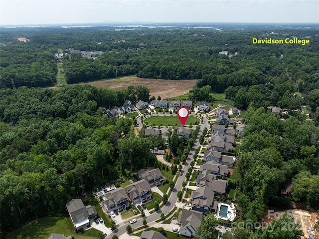 1550 Matthew Mcclure Cir, Davidson, NC 28036 - aerial overview of property's location with a heavily wooded area and nearby suburban area