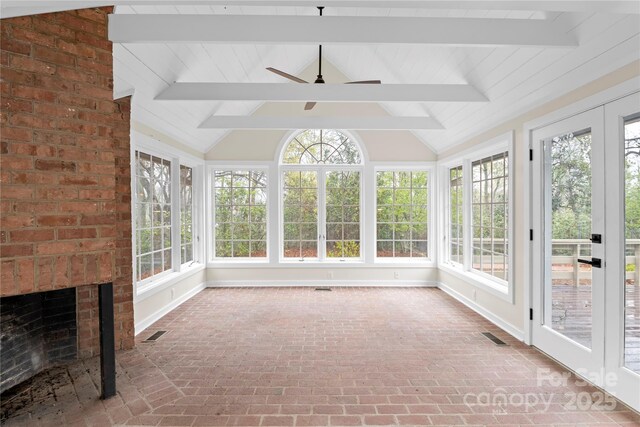 1476 New Market Rd, Tryon, NC 28782 - unfurnished sunroom featuring brick floor, vaulted ceiling with beams, visible vents, and a wealth of natural light