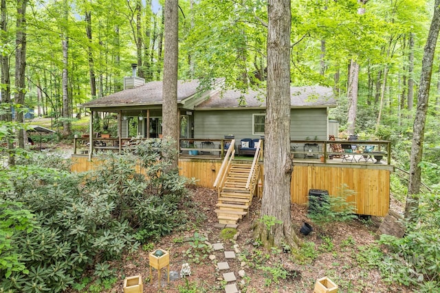 170 Blue Jay Loop, Maggie Valley, NC 28751 - back of house with stairs, a chimney, and a deck