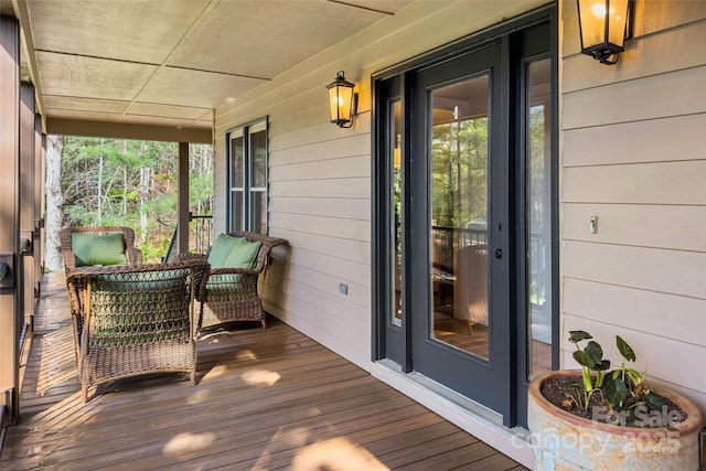 deck with covered porch