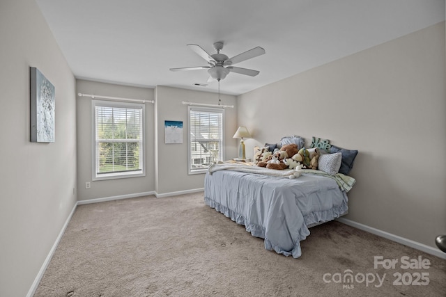 1809 Robbins Meadows Dr, Waxhaw, NC 28173 - carpeted bedroom featuring baseboards and a ceiling fan