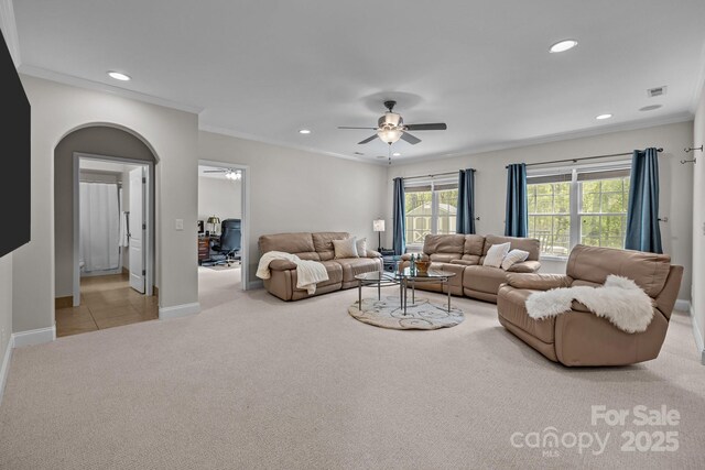 1809 Robbins Meadows Dr, Waxhaw, NC 28173 - carpeted living room with a ceiling fan, recessed lighting, and crown molding