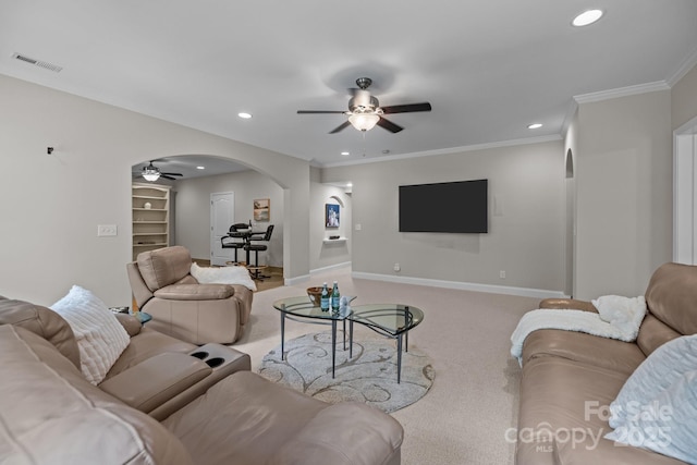 1809 Robbins Meadows Dr, Waxhaw, NC 28173 - living area with a ceiling fan, arched walkways, carpet floors, recessed lighting, and ornamental molding