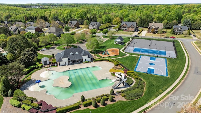 1809 Robbins Meadows Dr, Waxhaw, NC 28173 - aerial view of residential area with a heavily wooded area