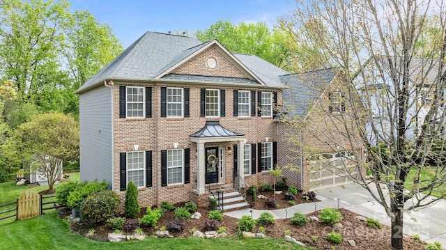 1809 Robbins Meadows Dr, Waxhaw, NC 28173 - view of front of home featuring concrete driveway, brick siding, an attached garage, and roof with shingles
