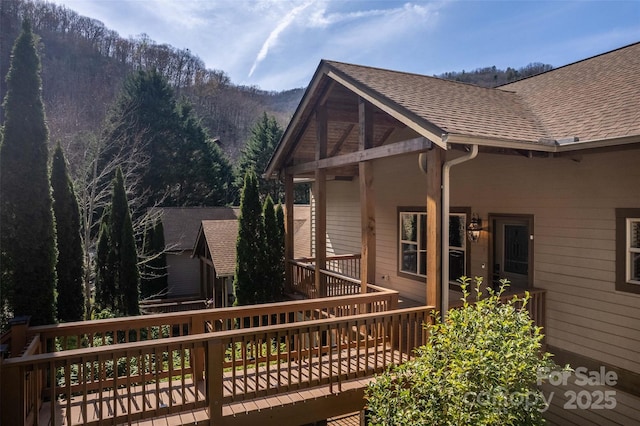 226 Sawgrass Dr Unit 3, Whittier, NC 28789 - view of side of home featuring roof with shingles