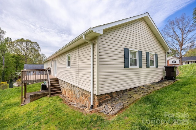 207 New Orleans Blvd, Morganton, NC 28655 - view of side of property with a lawn, central AC unit, stairway, and a deck