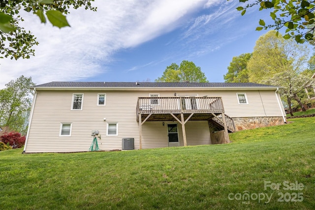 207 New Orleans Blvd, Morganton, NC 28655 - back of property with a wooden deck, a lawn, and central AC unit