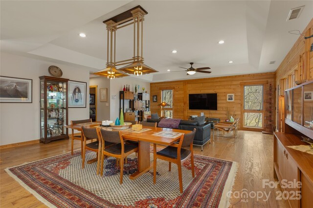 263 Mine Cove Rd, Spruce Pine, NC 28777 - dining area with visible vents, recessed lighting, ceiling fan, and a tray ceiling