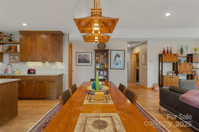 263 Mine Cove Rd, Spruce Pine, NC 28777 - dining space featuring light wood finished floors, recessed lighting, and visible vents