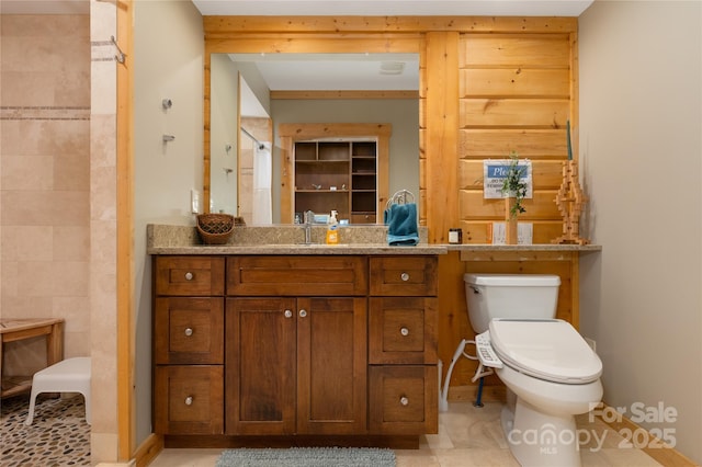 263 Mine Cove Rd, Spruce Pine, NC 28777 - bathroom featuring toilet, tile patterned flooring, and vanity