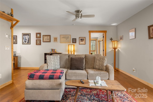 263 Mine Cove Rd, Spruce Pine, NC 28777 - living area with ceiling fan, wood finished floors, and baseboards