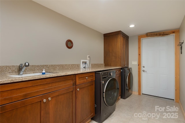 263 Mine Cove Rd, Spruce Pine, NC 28777 - clothes washing area featuring washer and dryer, recessed lighting, cabinet space, and a sink